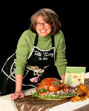 Load image into Gallery viewer, Author Renee Ferguson with her award winning cookbook and favorite turkey presentation with frosted grapes.  Renee is owner of JUNK KING in Dallas and North Texas since 2012.  
